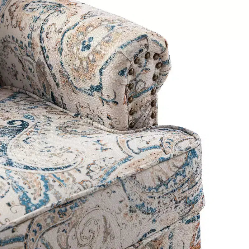 Gepolsterter Sessel aus Holz mit Blumenmuster, Paneel-Armlehnen und Kamelrückenlehne