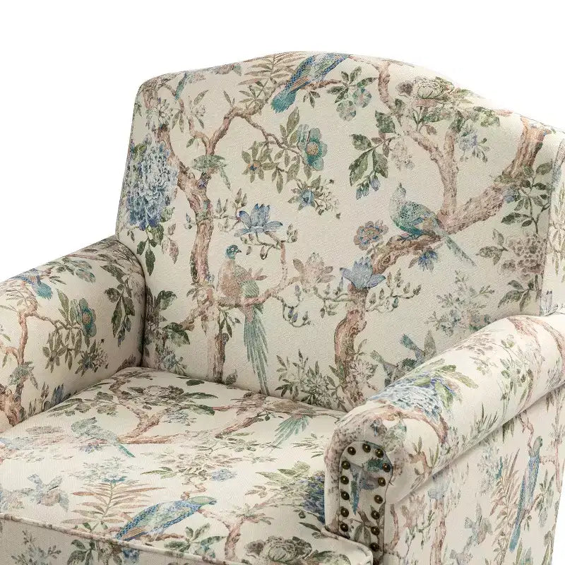 Gepolsterter Sessel aus Holz mit Blumenmuster, Paneel-Armlehnen und Kamelrückenlehne