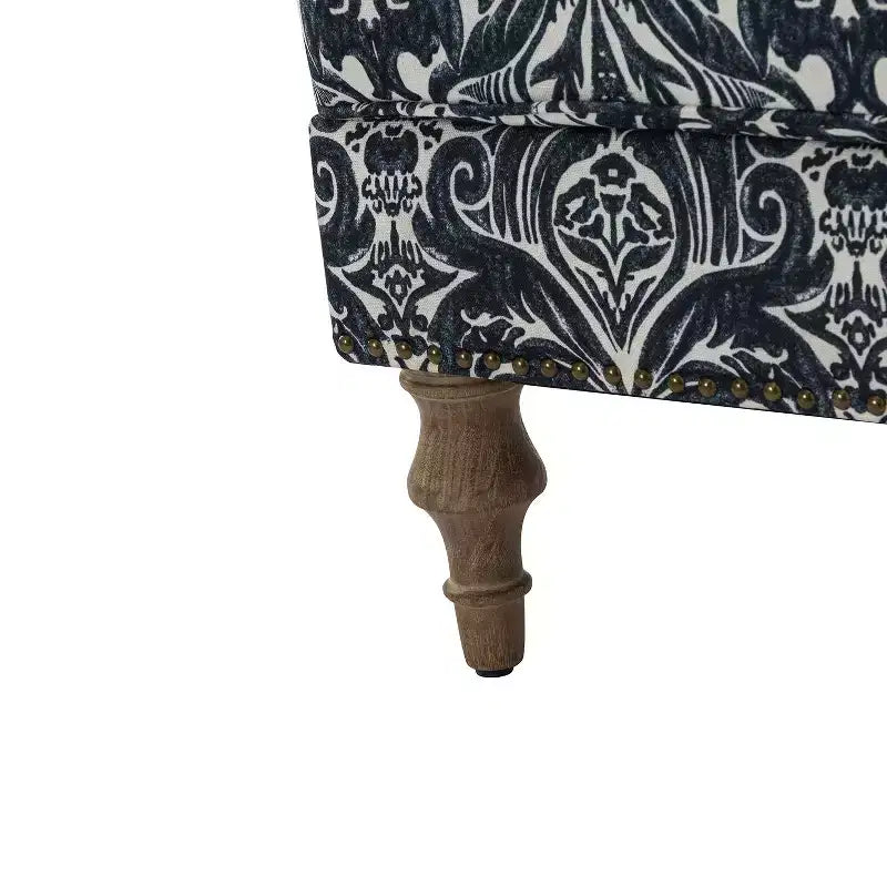 Gepolsterter Sessel aus Holz mit Blumenmuster, Paneel-Armlehnen und Kamelrückenlehne
