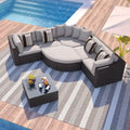 Modernes 7-teiliges Outdoor-Sofa-Set aus Korbgeflecht mit Couchtisch, Auflagen und gestreiften Kissen, geeignet für Terrasse, Garten und Veranda