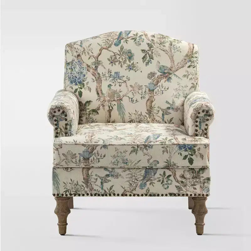 Gepolsterter Sessel aus Holz mit Blumenmuster, Paneel-Armlehnen und Kamelrückenlehne
