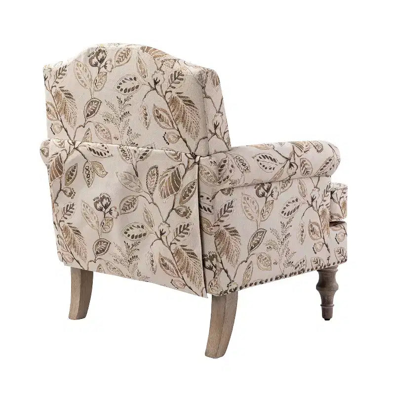 Gepolsterter Sessel aus Holz mit Blumenmuster, Paneel-Armlehnen und Kamelrückenlehne