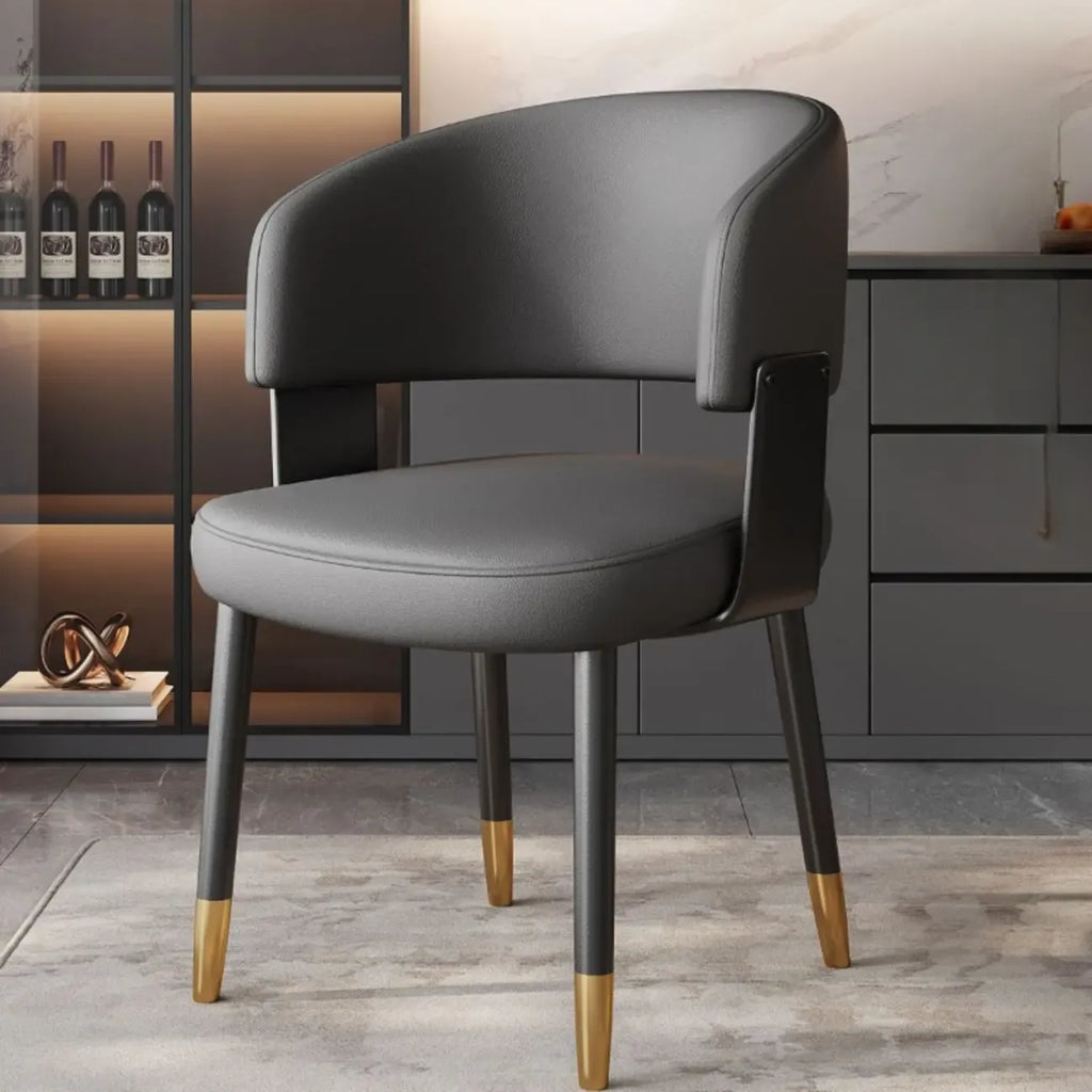 Modern gepolsterter Esszimmerstuhl in Glam-Optik mit Lederbezug