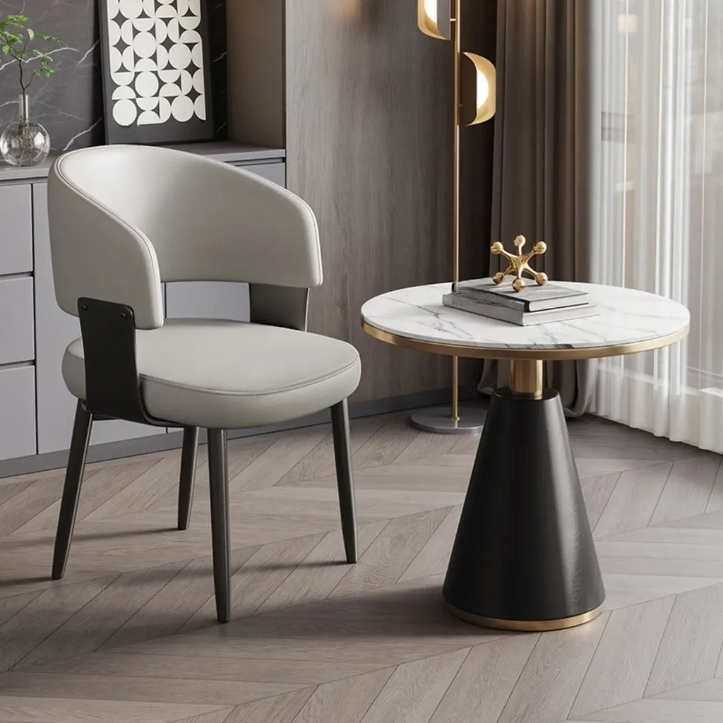 Modern gepolsterter Esszimmerstuhl in Glam-Optik mit Lederbezug