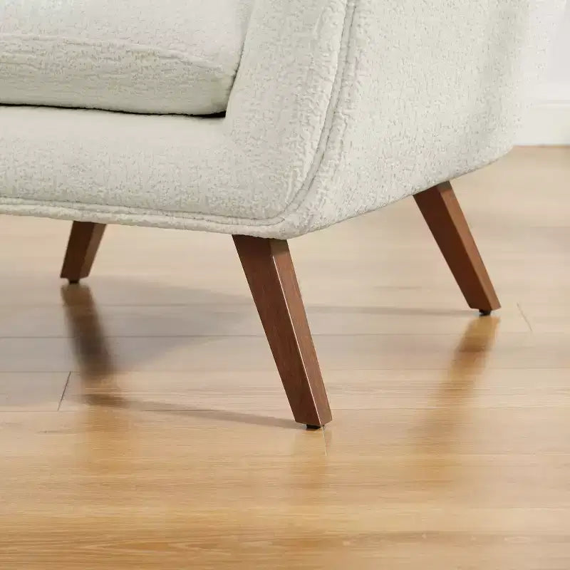 Art Leon Bequemer Akzentstuhl aus Jacquard-Flanell mit Holzbeinen