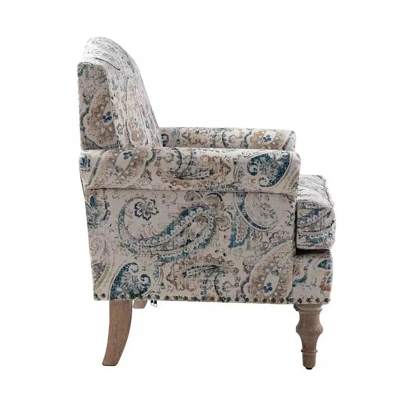 Gepolsterter Sessel aus Holz mit Blumenmuster, Paneel-Armlehnen und Kamelrückenlehne